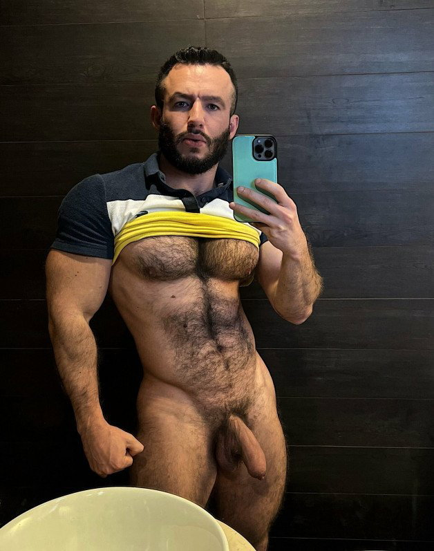 Photo by Nickplus33 with the username @Nickplus33, who is a verified user, posted on February 27, 2024 and the text says '#muscled #hairy #beard #uncut  #selfie #youngdilf'