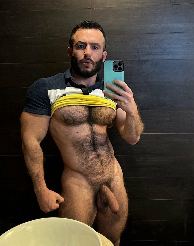 Photo by Nickplus33 with the username @Nickplus33, who is a verified user,  February 27, 2024 at 2:47 AM and the text says '#muscled #hairy #beard #uncut  #selfie #youngdilf'