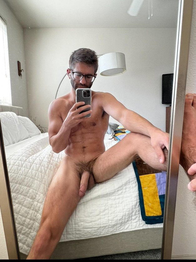 Photo by Nickplus33 with the username @Nickplus33, who is a verified user,  June 9, 2024 at 2:52 AM and the text says '#manspread  #specs #toned #dilf #scruff  #trimmed  #hung'