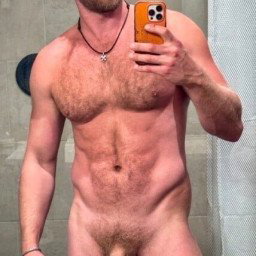 Photo by Nickplus33 with the username @Nickplus33, who is a verified user,  February 28, 2024 at 3:52 AM and the text says '#beard #caps #chain #uncut  #bush #dilf #loganstevens #obsession #selfie #blondes'