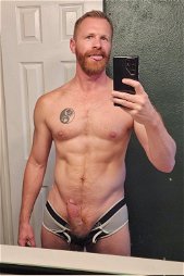 Photo by Nickplus33 with the username @Nickplus33, who is a verified user,  May 22, 2024 at 1:32 AM and the text says '#selfie #ginger #dilf #beard #tongue #happytrail #bush #reveal'