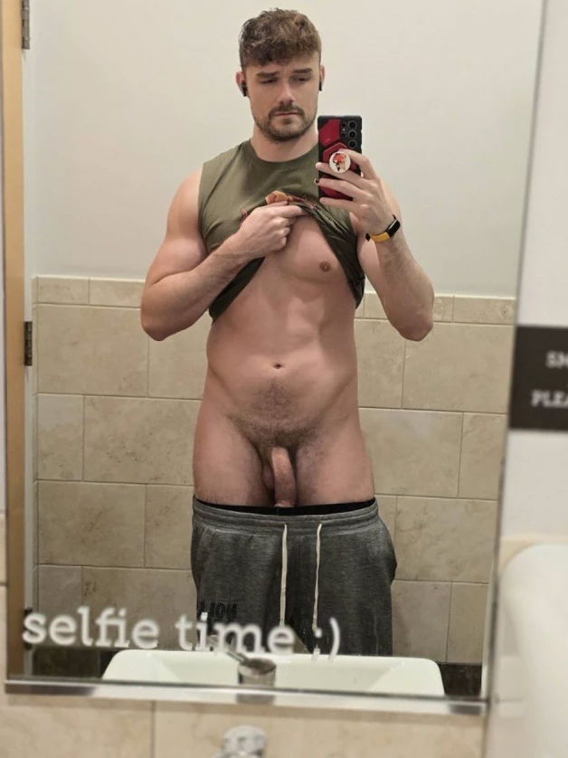 Photo by Nickplus33 with the username @Nickplus33, who is a verified user,  March 28, 2024 at 3:03 AM and the text says '#selfie #otter  #toned #beard #hung #longdick #reveal #bush #trimmed'