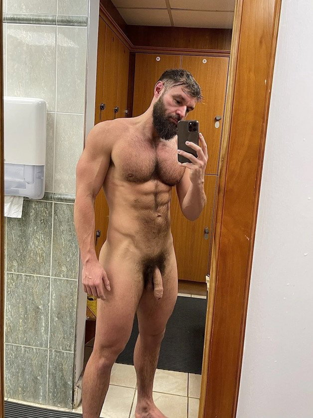 Photo by Nickplus33 with the username @Nickplus33, who is a verified user,  June 13, 2024 at 1:56 AM and the text says '#selfie #daddy #beard #toned #hairy #thickbush #hung #uncut  #lockerroom'