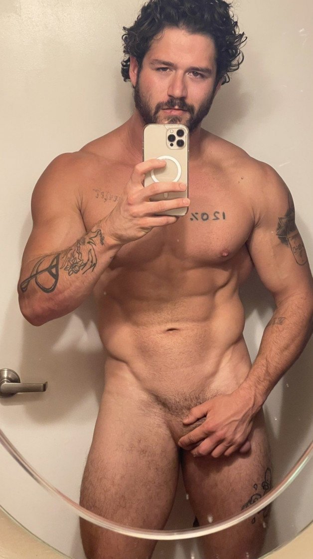 Photo by Nickplus33 with the username @Nickplus33, who is a verified user,  April 30, 2024 at 12:57 AM and the text says '#selfie #muscled #smooth #beard #ink #trimmed  #youngdilf'