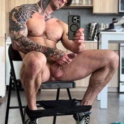 Photo by Nickplus33 with the username @Nickplus33, who is a verified user,  May 2, 2024 at 3:00 AM and the text says '#selfie #ink  #otter  #hung #longdick #manspread  #balls #trimmed  #toned'