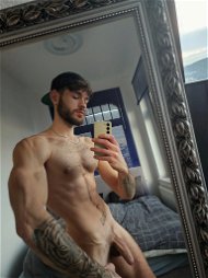 Photo by Nickplus33 with the username @Nickplus33, who is a verified user,  May 19, 2024 at 3:02 AM and the text says '#otter  #beard #ink #chain #hairychest #selfie #veiny #uncut  #toned'