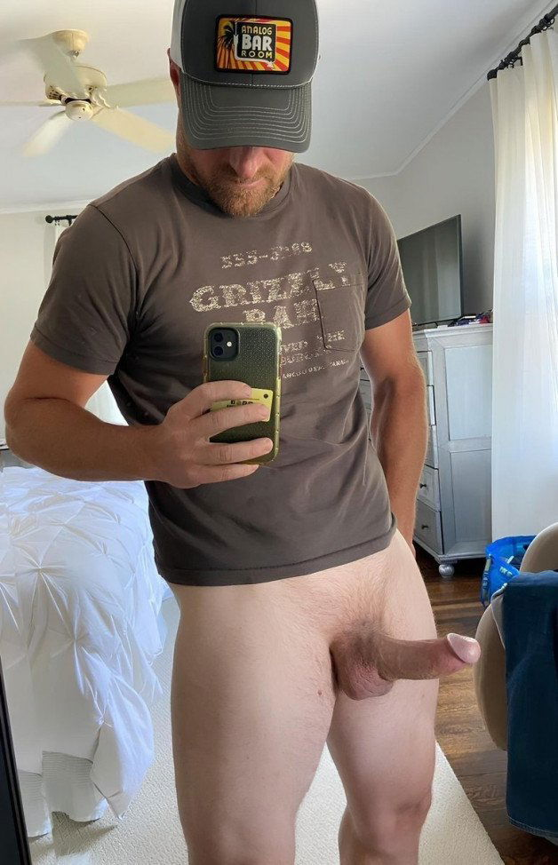 Photo by Nickplus33 with the username @Nickplus33, who is a verified user,  October 23, 2023 at 3:03 AM and the text says '#hung #dilf #beard #selfies #thickdick #caps'