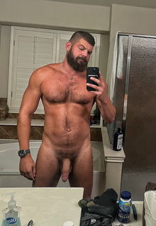 Photo by Nickplus33 with the username @Nickplus33, who is a verified user,  July 12, 2024 at 2:30 AM and the text says '#daddy #bear #dilf #selfie #beard #hairy #toned #bush #longdick #hung'