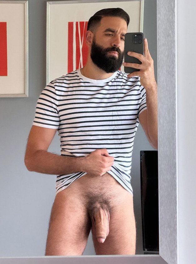 Photo by Nickplus33 with the username @Nickplus33, who is a verified user,  June 7, 2024 at 2:49 AM and the text says '#selfie #dilf #beard #hung #massivecock #thickdick #uncut  #fatcock #trimmed'