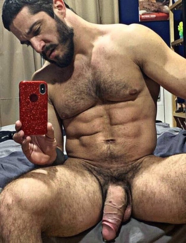 Photo by Nickplus33 with the username @Nickplus33, who is a verified user,  March 14, 2024 at 2:43 AM and the text says '#manspread  #hung #veiny #thickdick #hotel #massivecock #beercandick #beard #selfie'