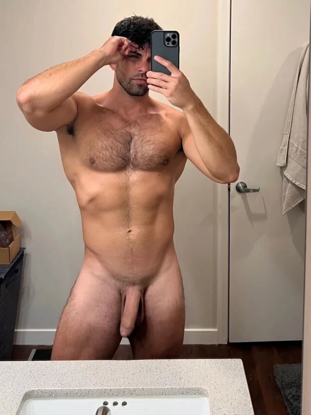 Photo by Nickplus33 with the username @Nickplus33, who is a verified user,  March 16, 2024 at 4:22 AM and the text says '#selfie #hairy #toned #hung #longdick #youngdilf #scruff'