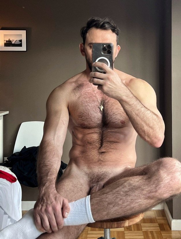 Photo by Nickplus33 with the username @Nickplus33, who is a verified user,  June 25, 2024 at 2:00 AM and the text says '#selfie #hairy #toned #bush #trimmed  #chain #beard #dilf'