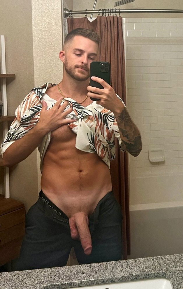 Photo by Nickplus33 with the username @Nickplus33, who is a verified user,  April 16, 2024 at 2:48 AM and the text says '#selfie #chain #otter  #beard #longdick #trimmed  #balls #tanned #ink #veiny #ink #reveal'