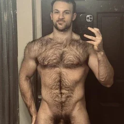 Photo by Nickplus33 with the username @Nickplus33, who is a verified user,  March 22, 2024 at 2:36 AM and the text says '#hairy #otter  #selfie #muscled #bush #thickbush #scruff'