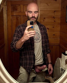 Photo by Nickplus33 with the username @Nickplus33, who is a verified user,  February 2, 2024 at 4:14 AM and the text says '#selfies #dilf #bald #beard #hung #thickdick #balls'