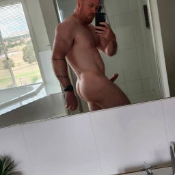 Photo by Nickplus33 with the username @Nickplus33, who is a verified user,  May 10, 2024 at 6:06 AM and the text says '#beefy #toned #bald #dilf #daddy #shower #spear  #selfie #ginger'