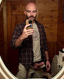 Photo by Nickplus33 with the username @Nickplus33, who is a verified user,  May 19, 2024 at 6:20 AM and the text says '#bald #scruff  #youngdilf #selfie #spear #curved #hung #reveal #wc #bush #balls'