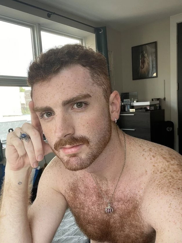 Photo by Nickplus33 with the username @Nickplus33, who is a verified user,  April 10, 2024 at 1:57 AM and the text says '#ginger #otter  #stache #scruff  #hairy #hairychest #chain'