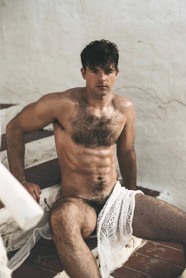 Photo by Nickplus33 with the username @Nickplus33, who is a verified user,  March 23, 2024 at 5:53 AM and the text says '#otter  #Fiachra #obsession #hairy #thickbush #manspread  #toned'