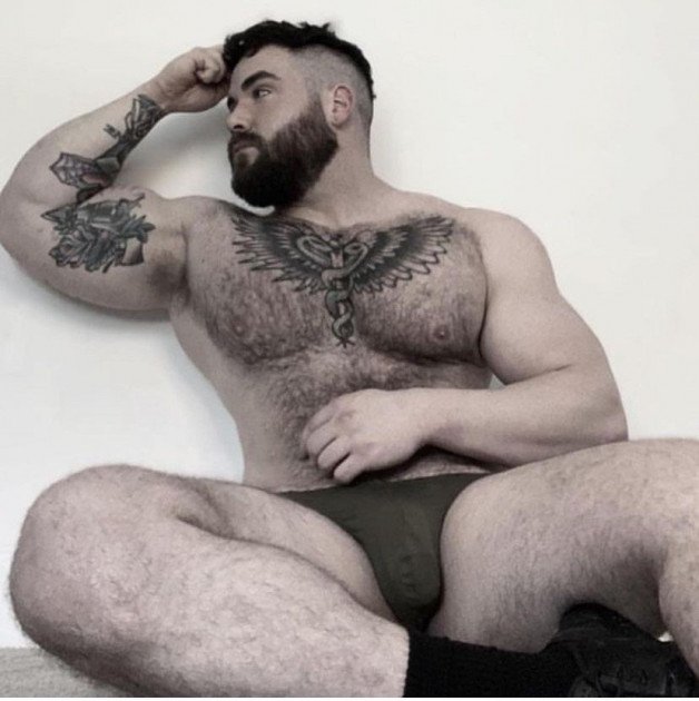 Photo by Nickplus33 with the username @Nickplus33, who is a verified user,  February 24, 2024 at 2:22 AM and the text says '#beefy #otter  #beard #bear  #series #ink #hairy #bulge'