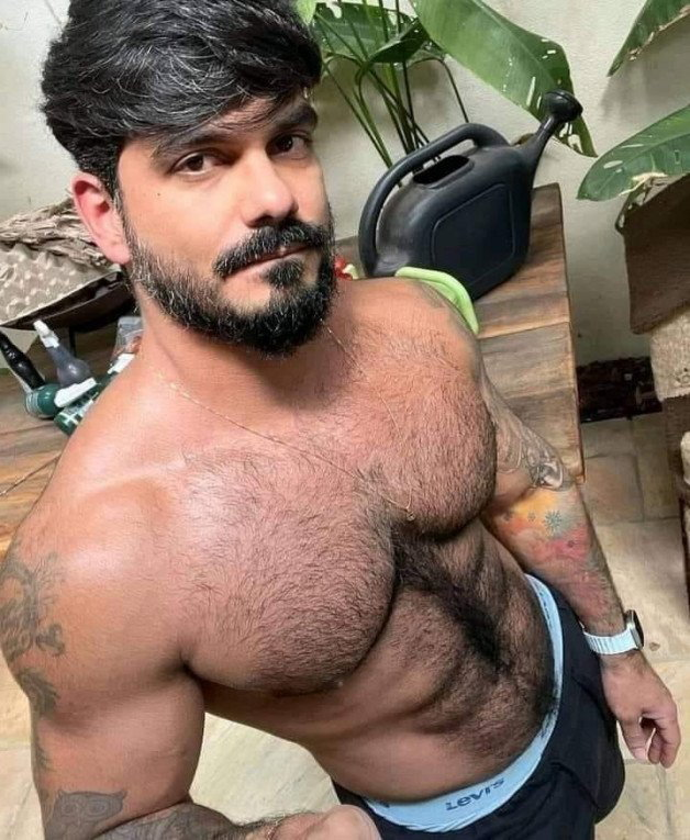Photo by Nickplus33 with the username @Nickplus33, who is a verified user,  April 25, 2024 at 2:14 AM and the text says '#hotel #youngdilf #hairychest #trimmed  #ink'