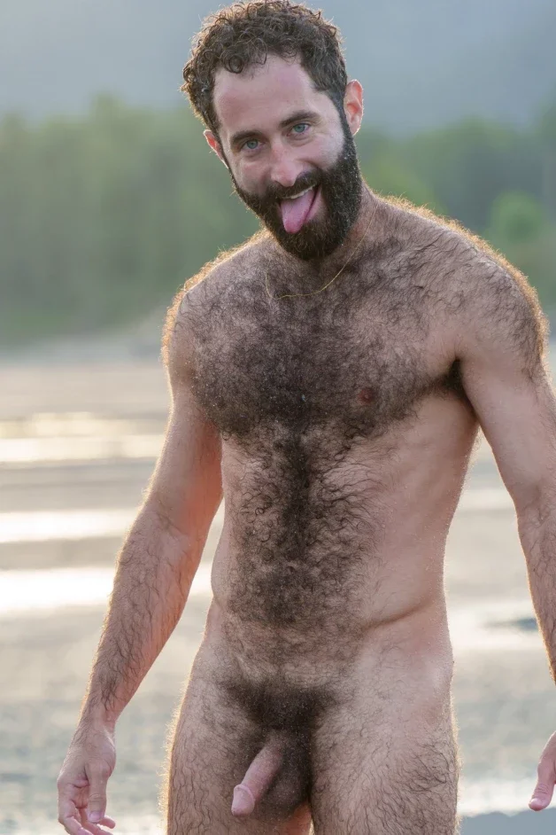 Photo by Nickplus33 with the username @Nickplus33, who is a verified user,  March 23, 2024 at 5:32 AM and the text says '#beard #tongue #chain #hairy #bush #outdoors #youngdilf #thickbush'