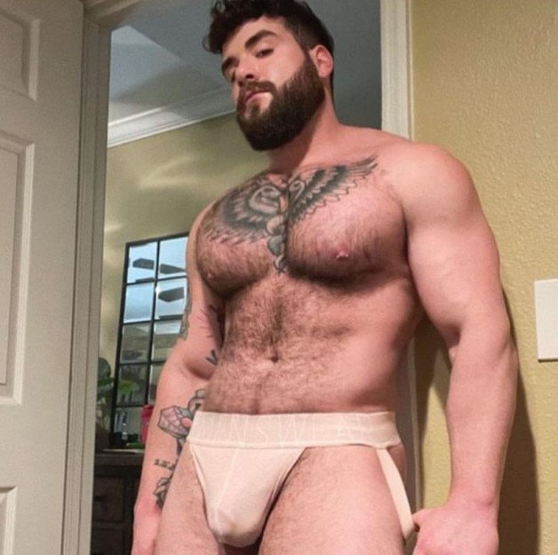 Photo by Nickplus33 with the username @Nickplus33, who is a verified user,  February 24, 2024 at 2:22 AM and the text says '#beefy #otter  #beard #bear  #series #ink #hairy #bulge'