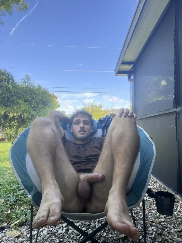 Photo by Nickplus33 with the username @Nickplus33, who is a verified user,  April 15, 2024 at 1:53 AM and the text says '#outdoors #otter  #stache #dimple #manspread  #balls'