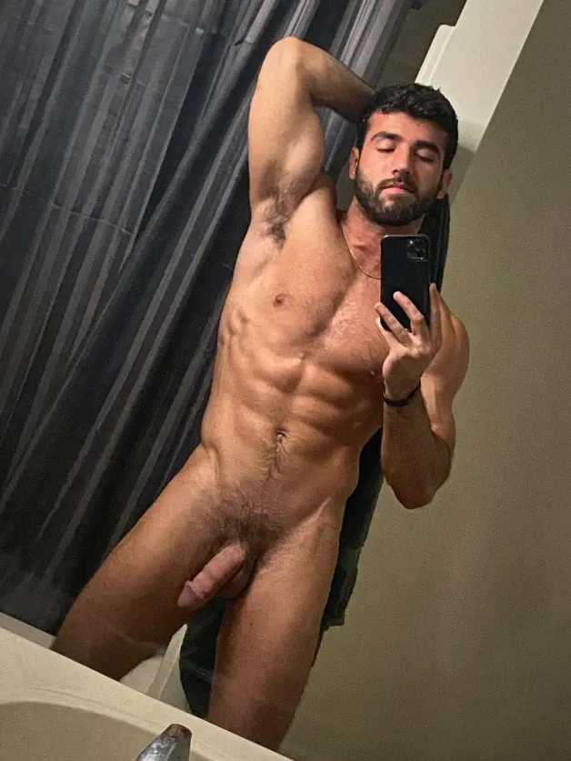 Photo by Nickplus33 with the username @Nickplus33, who is a verified user,  March 26, 2024 at 2:52 AM and the text says '#selfie #otter  #beard #scruff  #muscled #trimmed  #chain #hung #longdick'