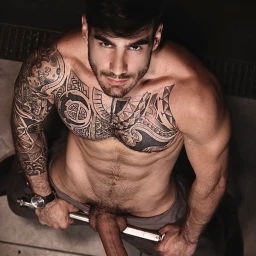 Photo by Nickplus33 with the username @Nickplus33, who is a verified user,  May 6, 2024 at 4:35 AM and the text says '#otter  #ink #toned #hung #scruff  #longdick #bush #trimmed #massivecock'