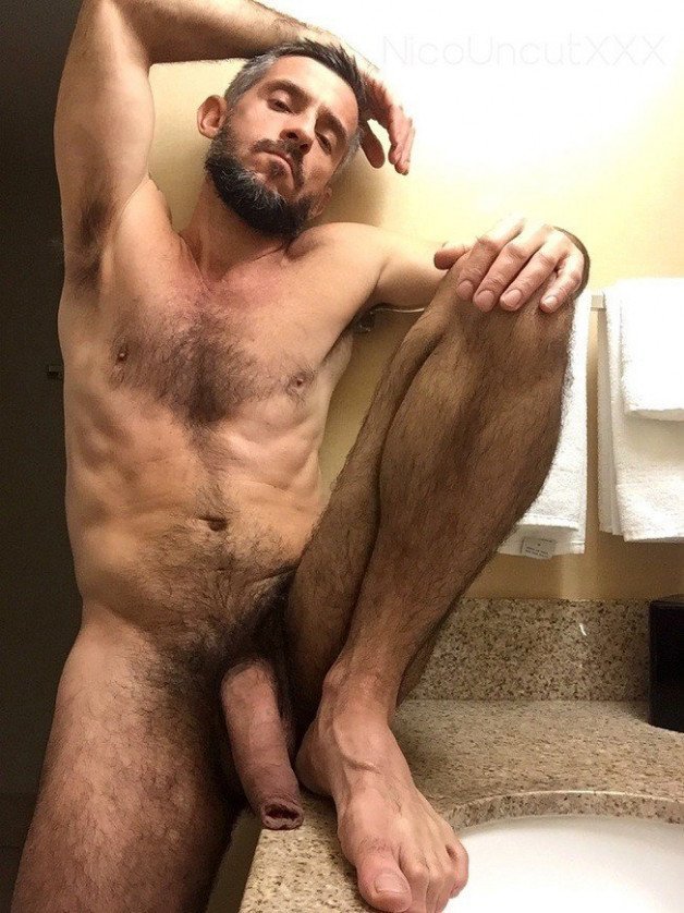 Photo by Nickplus33 with the username @Nickplus33, who is a verified user,  December 25, 2023 at 5:10 AM and the text says '#otter #manspread #hung #schlong #thickdick #bush #monstercock #beard #foreskin'