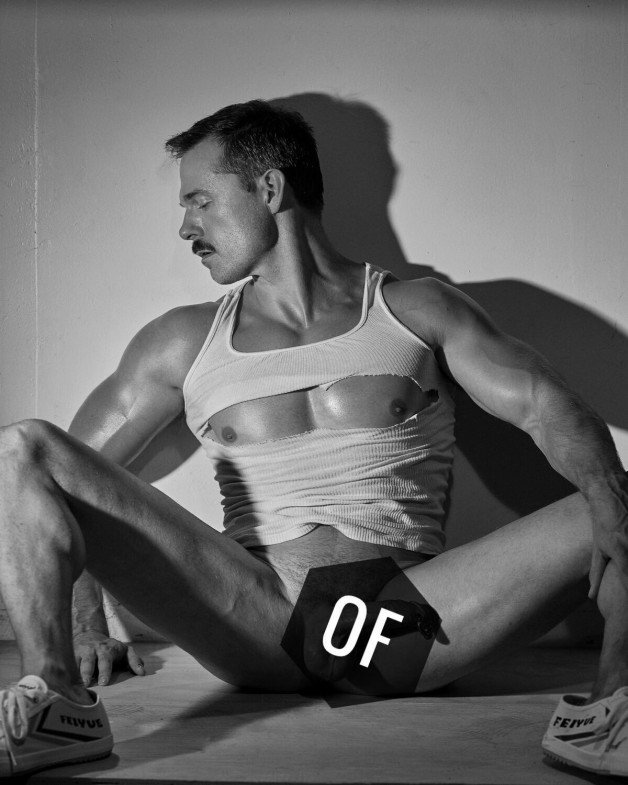 Photo by Nickplus33 with the username @Nickplus33, who is a verified user,  June 8, 2024 at 3:01 AM and the text says '#blackandwhite #manspread  #muscled #stache #youngdilf #smooth'