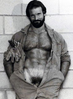 Photo by Nickplus33 with the username @Nickplus33, who is a verified user,  June 21, 2024 at 2:37 AM and the text says '#vintage #dilf #daddy #hairy #trimmed  #hairychest #beard #muscled  #blackandwhite #thickbush #bush'