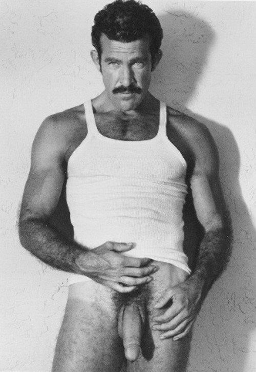 Photo by Nickplus33 with the username @Nickplus33, who is a verified user,  May 25, 2024 at 2:57 AM and the text says '#stache #vintage #daddy #toned #hairychest #bush #blackandwhite'