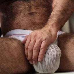 Photo by Nickplus33 with the username @Nickplus33, who is a verified user,  April 8, 2024 at 1:58 AM and the text says '#beefy #dilf #daddy #hairy #bulge #jockstrap #manspread'