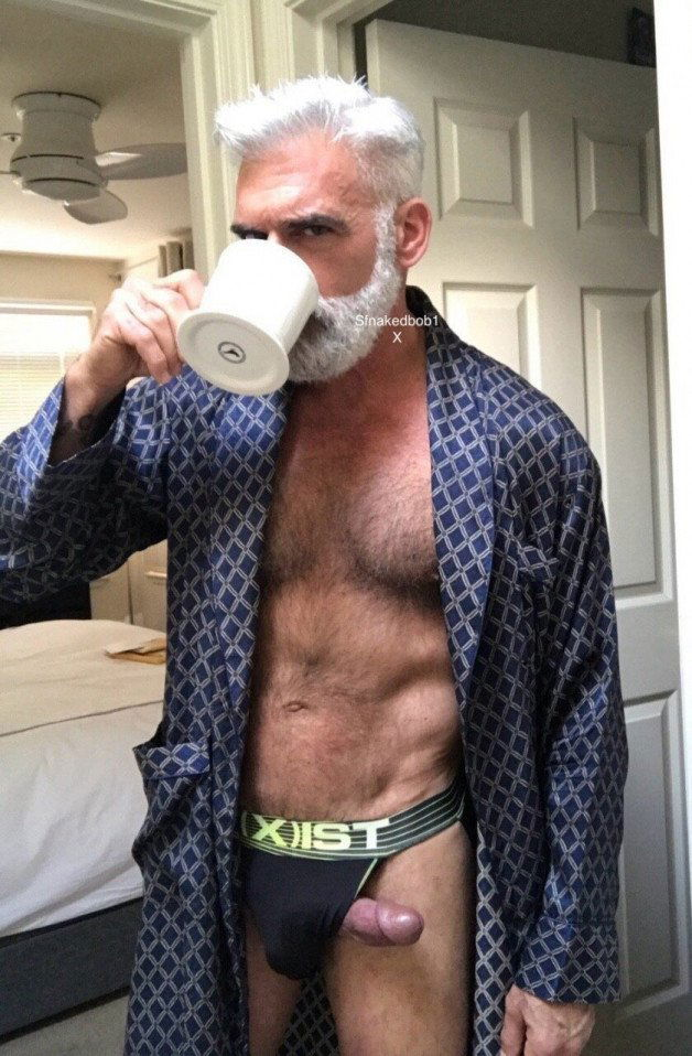 Photo by Nickplus33 with the username @Nickplus33, who is a verified user,  July 2, 2024 at 1:53 AM and the text says '#granddaddy #daddy #beard #silverfox #toned #hairy #coffee #reveal #hung #longdick'