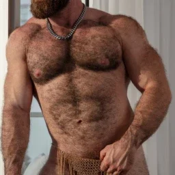 Photo by Nickplus33 with the username @Nickplus33, who is a verified user,  May 8, 2024 at 5:20 AM and the text says '#beefy #bear #beard #dilf #chain #beard #thickdick #hairy'