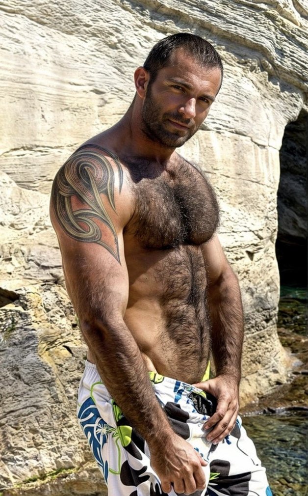 Photo by Nickplus33 with the username @Nickplus33, who is a verified user,  July 3, 2024 at 1:50 AM and the text says '#dilf #toned #hairy #scruff  #outdoors'