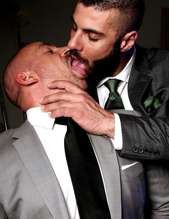 Photo by Nickplus33 with the username @Nickplus33, who is a verified user,  February 5, 2024 at 4:46 AM and the text says '#kissing #youngdilf #office #tongue #beard #bald'
