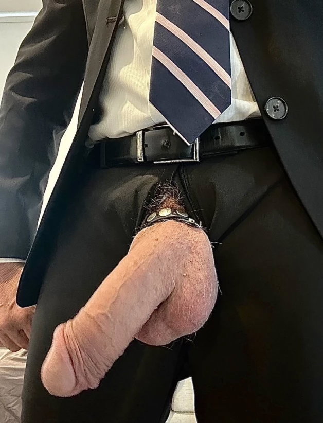 Photo by Nickplus33 with the username @Nickplus33, who is a verified user,  May 5, 2024 at 3:15 AM and the text says '#massivecock #monstercock #office #hung #thickdick #cockring #balls #reveal'