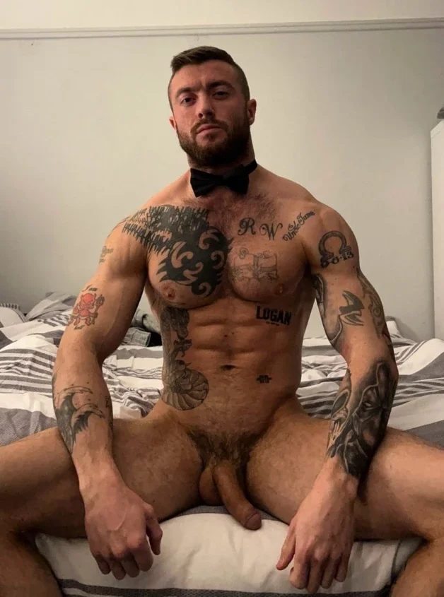 Photo by Nickplus33 with the username @Nickplus33, who is a verified user,  March 29, 2024 at 5:25 AM and the text says '#manspread  #dilf #ink #beard #hung #longdick #bush #hairy #toned #youngdilf'
