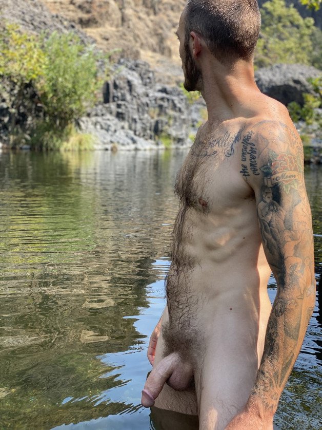 Photo by Nickplus33 with the username @Nickplus33, who is a verified user,  June 19, 2024 at 2:00 AM and the text says '#outdoors #dilf #toned #hairy #hairychest #hung #thickbush #bush #schlong  #beard #ink'