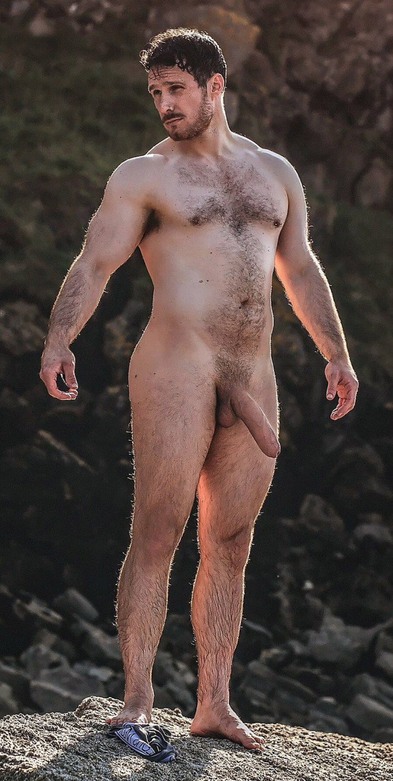 Photo by Nickplus33 with the username @Nickplus33, who is a verified user,  February 10, 2024 at 3:55 AM and the text says '#beefy #outdoors #hung #longdick #uncut  #beard #scruff  #youngdilf #schlong  #youngdilf'
