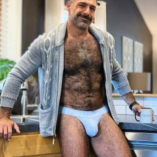 Photo by Nickplus33 with the username @Nickplus33, who is a verified user,  November 3, 2023 at 4:41 AM and the text says '#hairy #daddy #dilf #scruff #stache #chain #bulge'