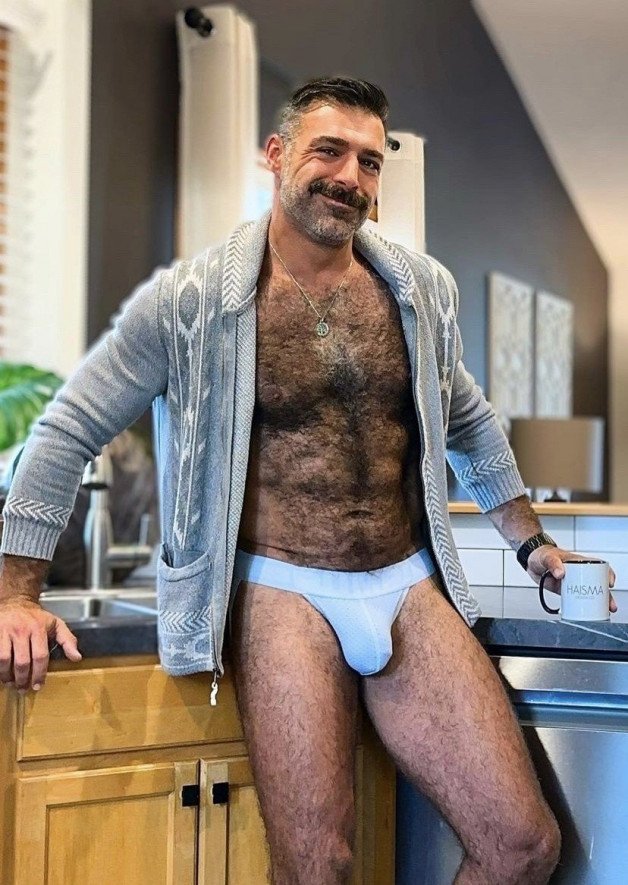 Photo by Nickplus33 with the username @Nickplus33, who is a verified user,  November 3, 2023 at 4:41 AM and the text says '#hairy #daddy #dilf #scruff #stache #chain #bulge'