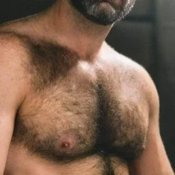 Photo by Nickplus33 with the username @Nickplus33, who is a verified user,  March 30, 2024 at 5:45 AM and the text says '#dilf #toned  #hairy #beard #hairychest'