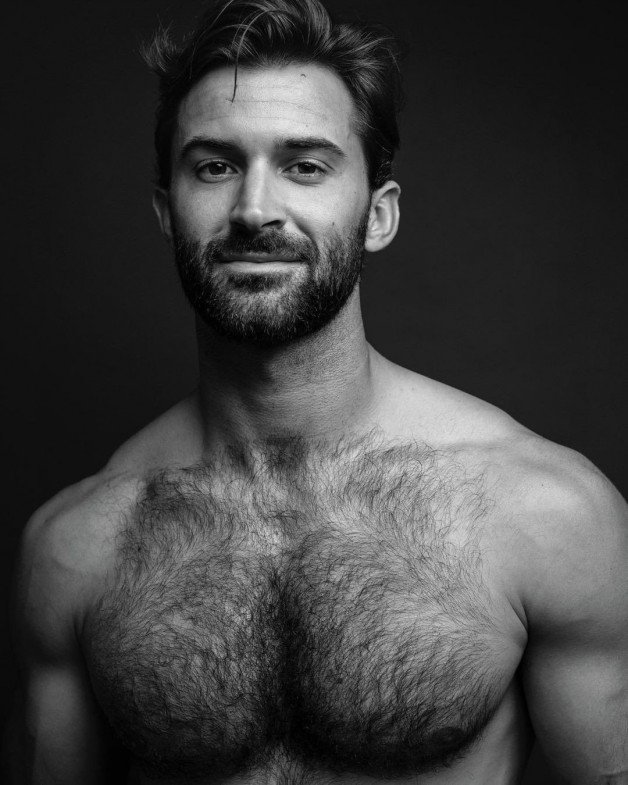 Photo by Nickplus33 with the username @Nickplus33, who is a verified user,  July 4, 2024 at 3:00 AM and the text says '#dilf #hairy #hairychest #scruff  #toned'