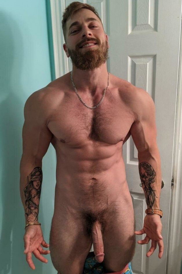 Photo by Nickplus33 with the username @Nickplus33, who is a verified user,  April 16, 2024 at 2:39 AM and the text says '#beard #longdick #bush #chain #ink #ginger #youngdilf #toned'