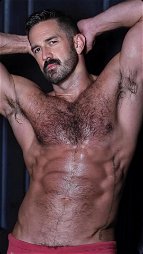 Photo by Nickplus33 with the username @Nickplus33, who is a verified user,  May 23, 2024 at 11:25 AM and the text says '#scruff  #stache #dilf #hairy #hairychest #toned'