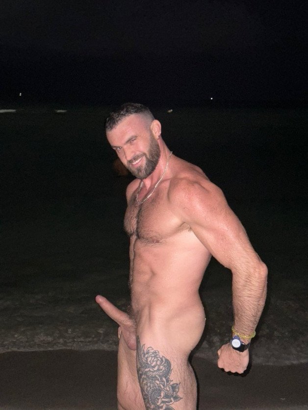 Photo by Nickplus33 with the username @Nickplus33, who is a verified user,  March 10, 2024 at 4:16 AM and the text says '#toned #muscled #spear #ink #beard #beach #chain #longdick #balls #youngdilf #dilf'